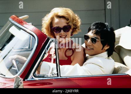 Lauren Holly & Jason Scott Lee Film: Dragon: The Bruce Lee Story (1993) Characters: linda lee, bruce lee  Director: Rob Cohen 07 May 1993   **WARNING** This Photograph is for editorial use only and is the copyright of UNIVERSAL and/or the Photographer assigned by the Film or Production Company and can only be reproduced by publications in conjunction with the promotion of the above Film. A Mandatory Credit To UNIVERSAL is required. The Photographer should also be credited when known. No commercial use can be granted without written authority from the Film Company. Stock Photo