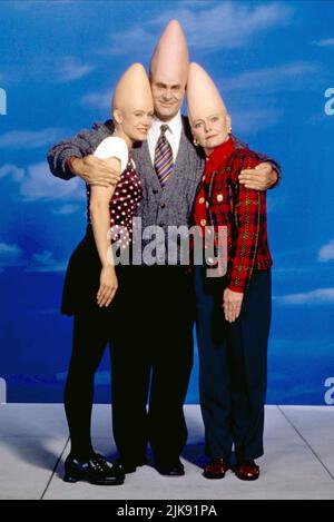 Michelle Burke, Dan Aykroyd & Jane Curtin Film: Coneheads (1993) Characters: Connie Conehead, Beldar Conehead, Prymatt Conehead  Director: Steve Barron 23 July 1993   **WARNING** This Photograph is for editorial use only and is the copyright of PARAMOUNT PICTURES and/or the Photographer assigned by the Film or Production Company and can only be reproduced by publications in conjunction with the promotion of the above Film. A Mandatory Credit To PARAMOUNT PICTURES is required. The Photographer should also be credited when known. No commercial use can be granted without written authority from th Stock Photo
