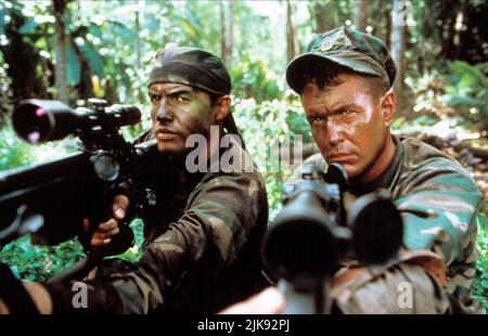 https://l450v.alamy.com/450v/2jk92pj/billy-zane-tom-berenger-film-sniper-usaper-1993-characters-richard-miller-thomas-beckett-director-luis-llosa-29-january-1993-warning-this-photograph-is-for-editorial-use-only-and-is-the-copyright-of-tristar-pictures-andor-the-photographer-assigned-by-the-film-or-production-company-and-can-only-be-reproduced-by-publications-in-conjunction-with-the-promotion-of-the-above-film-a-mandatory-credit-to-tristar-pictures-is-required-the-photographer-should-also-be-credited-when-known-no-commercial-use-can-be-granted-without-written-authority-from-the-film-company-2jk92pj.jpg