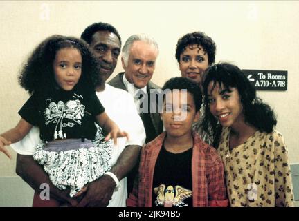 Brooke Fontaine, Bill Cosby, Ian Bannen, Salim Grant, Denise Nicholas & Kimberly Russell Film: Ghost Dad (USA 1990) Characters: Elliot Hopper,Sir Edith Moser,Diane Hopper,Daniel 'Danny' Hopper & Amanda Hopper  Director: Sidney Poitier 29 June 1990   **WARNING** This Photograph is for editorial use only and is the copyright of UNIVERSAL and/or the Photographer assigned by the Film or Production Company and can only be reproduced by publications in conjunction with the promotion of the above Film. A Mandatory Credit To UNIVERSAL is required. The Photographer should also be credited when known. N Stock Photo