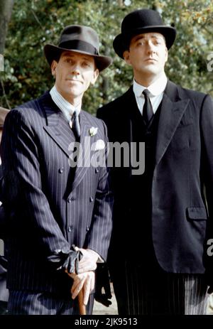 Hugh Laurie And Stephen Fry Television: Jeeves And Wooster (1990) Characters: Bertie Wooster AND Reginald Jeeves  16 May 1993   **WARNING** This Photograph is for editorial use only and is the copyright of GRANADA TV and/or the Photographer assigned by the Film or Production Company and can only be reproduced by publications in conjunction with the promotion of the above Film. A Mandatory Credit To GRANADA TV is required. The Photographer should also be credited when known. No commercial use can be granted without written authority from the Film Company. Stock Photo