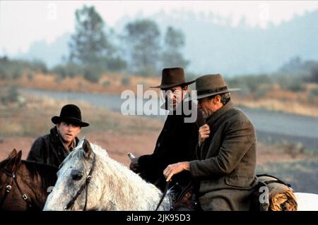 Jaimz Woolvett, Morgan Freeman & Clint Eastwood Film: Unforgiven (USA 1992) Characters: The Schofield Kid,Ned Logan & William 'Bill' Munny  Director: Clint Eastwood 03 August 1992   **WARNING** This Photograph is for editorial use only and is the copyright of WARNER BROS. and/or the Photographer assigned by the Film or Production Company and can only be reproduced by publications in conjunction with the promotion of the above Film. A Mandatory Credit To WARNER BROS. is required. The Photographer should also be credited when known. No commercial use can be granted without written authority from Stock Photo