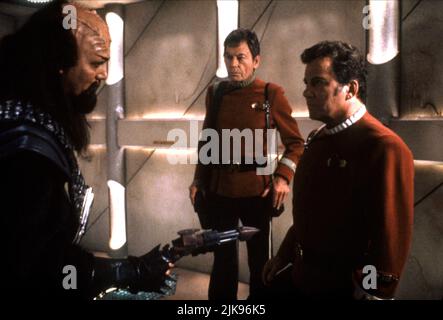 Deforest Kelley & William Shatner Film: Star Trek Vi: The Undiscovered Country (USA 1989) Characters: Dr. Leonard  Director: Nicholas Meyer 03 December 1991   **WARNING** This Photograph is for editorial use only and is the copyright of PARAMOUNT PICTURES and/or the Photographer assigned by the Film or Production Company and can only be reproduced by publications in conjunction with the promotion of the above Film. A Mandatory Credit To PARAMOUNT PICTURES is required. The Photographer should also be credited when known. No commercial use can be granted without written authority from the Film C Stock Photo