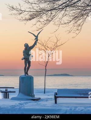 Lynch Park The Falconer Statue at Dawn in Winter with Newly Fallen Snow Stock Photo