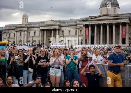 London, UK. 31st July, 2022. England fans are seen anxiously waiting for the England team to score in the match. Hundreds of thousands of football fans gathered at Trafalgar Square Women's Euro 2022 fans zone to watch the Livestream of the final football match between England and Germany. England team beat Germany 2-1 at extra time and ends the long wait for the first major football tournament trophy. Credit: SOPA Images Limited/Alamy Live News Stock Photo