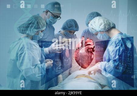 Surgeons using digital twin technology while operating patient in modern hospital Stock Photo