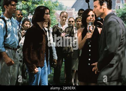 Neve Campbell, Courteney Cox & Liev Schreiber Film: Scream 2 (USA 1997) Characters: Sidney Prescott,Gale Weathers & Cotton Weary  Director: Wes Craven 10 December 1997   **WARNING** This Photograph is for editorial use only and is the copyright of DIMENSION FILMS and/or the Photographer assigned by the Film or Production Company and can only be reproduced by publications in conjunction with the promotion of the above Film. A Mandatory Credit To DIMENSION FILMS is required. The Photographer should also be credited when known. No commercial use can be granted without written authority from the F Stock Photo