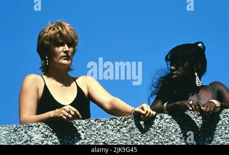 Linda Henry & Tameka Empson Film: Beautiful Thing (1996) Characters: Sandra Gangel & Leah Russell  Director: Hettie Macdonald 28 March 1996   **WARNING** This Photograph is for editorial use only and is the copyright of CHANNEL FOUR FILMS and/or the Photographer assigned by the Film or Production Company and can only be reproduced by publications in conjunction with the promotion of the above Film. A Mandatory Credit To CHANNEL FOUR FILMS is required. The Photographer should also be credited when known. No commercial use can be granted without written authority from the Film Company. Stock Photo