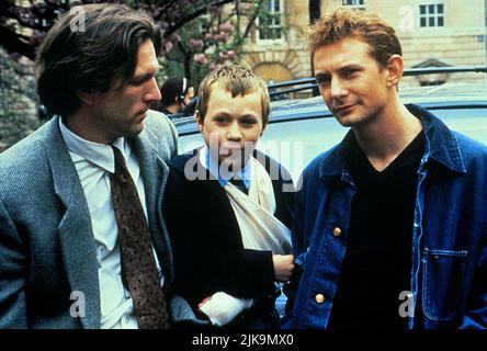 Martin Donovan, Sam Bould, Ian Hart Film: Hollow Reed (1998) Characters: Martyn Wyatt,Oliver Wyatt,Tom Dixon  Director: Angela Pope 31 May 1996   **WARNING** This Photograph is for editorial use only and is the copyright of CHANNEL FOUR and/or the Photographer assigned by the Film or Production Company and can only be reproduced by publications in conjunction with the promotion of the above Film. A Mandatory Credit To CHANNEL FOUR is required. The Photographer should also be credited when known. No commercial use can be granted without written authority from the Film Company. Stock Photo