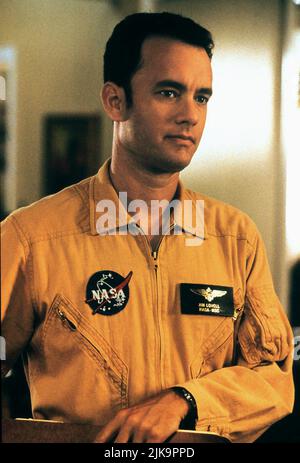 Tom Hanks Film: Apollo 13 (USA 1995) Characters: Jim Lovell  Director: Ron Howard 22 June 1995   **WARNING** This Photograph is for editorial use only and is the copyright of UNIVERSAL and/or the Photographer assigned by the Film or Production Company and can only be reproduced by publications in conjunction with the promotion of the above Film. A Mandatory Credit To UNIVERSAL is required. The Photographer should also be credited when known. No commercial use can be granted without written authority from the Film Company. Stock Photo