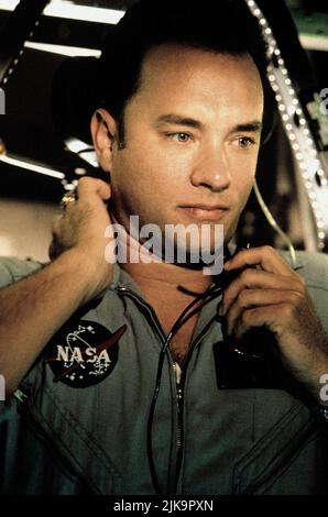 Tom Hanks Film: Apollo 13 (USA 1995) Characters: Jim Lovell  Director: Ron Howard 22 June 1995   **WARNING** This Photograph is for editorial use only and is the copyright of UNIVERSAL and/or the Photographer assigned by the Film or Production Company and can only be reproduced by publications in conjunction with the promotion of the above Film. A Mandatory Credit To UNIVERSAL is required. The Photographer should also be credited when known. No commercial use can be granted without written authority from the Film Company. Stock Photo