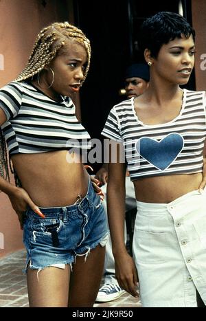 Paula Jai Parker & Nia Long Film: Friday (1995) Characters: Joi & Debbie  Director: F. Gary Gray 26 April 1995   **WARNING** This Photograph is for editorial use only and is the copyright of NEW LINE and/or the Photographer assigned by the Film or Production Company and can only be reproduced by publications in conjunction with the promotion of the above Film. A Mandatory Credit To NEW LINE is required. The Photographer should also be credited when known. No commercial use can be granted without written authority from the Film Company. Stock Photo