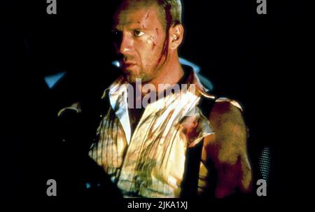 Bruce Willis Film: The Fifth Element (Le cinquième élément) Characters: Korben Dallas  Fr 1997, Director: Luc Besson 07 May 1997   **WARNING** This Photograph is for editorial use only and is the copyright of GAUMONT and/or the Photographer assigned by the Film or Production Company and can only be reproduced by publications in conjunction with the promotion of the above Film. A Mandatory Credit To GAUMONT is required. The Photographer should also be credited when known. No commercial use can be granted without written authority from the Film Company. Stock Photo