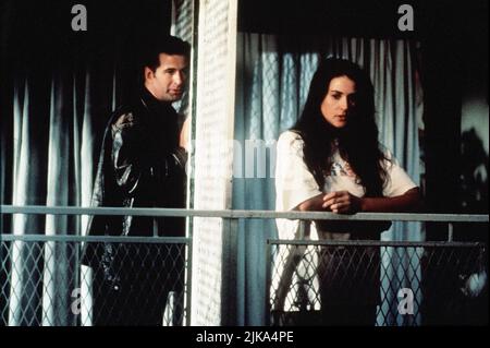 Alec Baldwin & Demi Moore Film: The Juror (1996) Characters: Teacher & Annie Laird  Director: Brian Gibson 02 February 1996   **WARNING** This Photograph is for editorial use only and is the copyright of COLUMBIA and/or the Photographer assigned by the Film or Production Company and can only be reproduced by publications in conjunction with the promotion of the above Film. A Mandatory Credit To COLUMBIA is required. The Photographer should also be credited when known. No commercial use can be granted without written authority from the Film Company. Stock Photo
