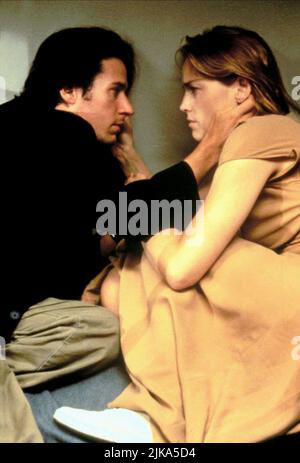 Rob Morrow & Sharon Stone Film: Last Dance (USA 1996) Characters: Rick Hayes & Cindy Liggett  Director: Bruce Beresford 03 May 1996   **WARNING** This Photograph is for editorial use only and is the copyright of TOUCHSTONE PICTURES and/or the Photographer assigned by the Film or Production Company and can only be reproduced by publications in conjunction with the promotion of the above Film. A Mandatory Credit To TOUCHSTONE PICTURES is required. The Photographer should also be credited when known. No commercial use can be granted without written authority from the Film Company. Stock Photo