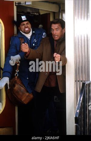 Sinbad & Arnold Schwarzenegger Film: Jingle All The Way (USA 1996) Characters: Myron Larabee, Howard Langston  Director: Brian Levant 16 November 1996   **WARNING** This Photograph is for editorial use only and is the copyright of 20TH CENTURY FOX and/or the Photographer assigned by the Film or Production Company and can only be reproduced by publications in conjunction with the promotion of the above Film. A Mandatory Credit To 20TH CENTURY FOX is required. The Photographer should also be credited when known. No commercial use can be granted without written authority from the Film Company. Stock Photo