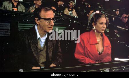 Woody Allen & Mira Sorvino Film: Mighty Aphrodite (USA 1995) Characters: LENNY, LINDA ASH  Director: Woody Allen 01 September 1995   **WARNING** This Photograph is for editorial use only and is the copyright of MAGNOLIA PICTURES and/or the Photographer assigned by the Film or Production Company and can only be reproduced by publications in conjunction with the promotion of the above Film. A Mandatory Credit To MAGNOLIA PICTURES is required. The Photographer should also be credited when known. No commercial use can be granted without written authority from the Film Company. Stock Photo
