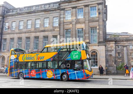 Edinburgh Cobbles tour double decker city explorer bus on Princes street in Edinburgh city centre, summer 2022,Scotland,UK Stock Photo