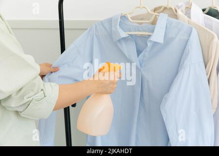 aesthetic laundry concept deodorizing, removing smell, odors from clothes Stock Photo