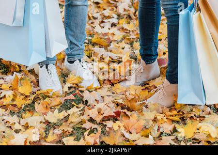autumn park walk couple yellow maple leaves Stock Photo