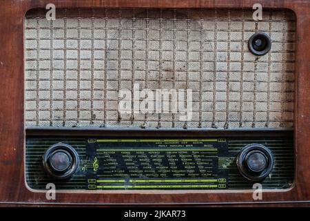 Old vintage tabletop radio set and receiver in wooden case Stock Photo