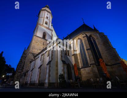 Leipzig, Germany - July 02, 2022: The city Center of the saxony metropolis at night. The Thomaskirche or St. Thomas Church illuminated under clear dar Stock Photo