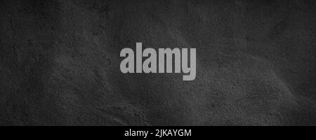 Black or dark gray rough grainy stone texture background Stock Photo