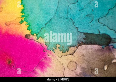 Liquid watercolor illustration of primary colors on rough paper creating a smooth, organic texture perfect for backgrounds and graphic design Stock Photo