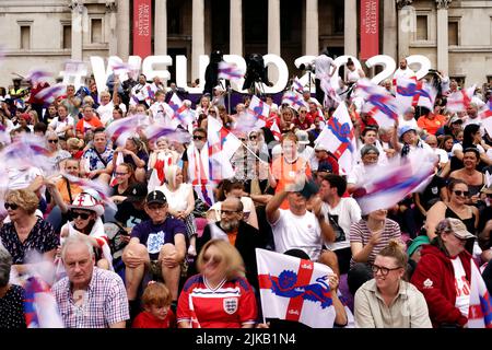 England fans during a fan celebration to commemorate England's historic UEFA Women's EURO 2022 triumph in Trafalgar Square, London. Picture date: Monday August 1, 2022. Stock Photo