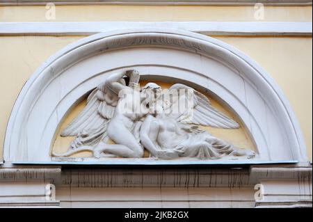 Fragment of old building with relief on facade in Lviv Ukraine Stock Photo