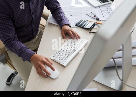 Cropped image of engineer working at his table on new project Stock Photo