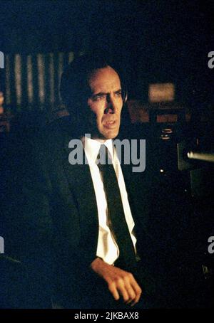 Nicolas Cage Film: 8mm (USA/DE 1999) Characters: Tom Welles  Director: Joel Schumacher 19 February 1999   **WARNING** This Photograph is for editorial use only and is the copyright of COLUMBIA PICTURES and/or the Photographer assigned by the Film or Production Company and can only be reproduced by publications in conjunction with the promotion of the above Film. A Mandatory Credit To COLUMBIA PICTURES is required. The Photographer should also be credited when known. No commercial use can be granted without written authority from the Film Company. Stock Photo