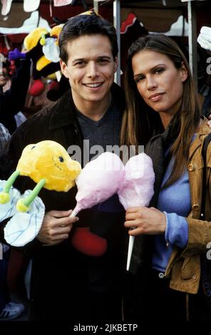 Scott Wolf & Rhona Mitra Television: Party Of Five : Season 6 (1999) Characters: Bailey Salinger & Holly Marie Beggins (12 episodes, 1999-2000) Candy Floss 05 October 1999   **WARNING** This Photograph is for editorial use only and is the copyright of FOX NETWORK and/or the Photographer assigned by the Film or Production Company and can only be reproduced by publications in conjunction with the promotion of the above Film. A Mandatory Credit To FOX NETWORK is required. The Photographer should also be credited when known. No commercial use can be granted without written authority from the Film Stock Photo