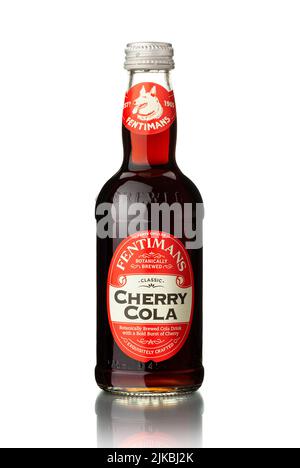CHISINAU, MOLDOVA - July 24, 2022: Fentimans Cherry Cola is the world's first cola brewed by botanical brewing on white background. File contains clip Stock Photo
