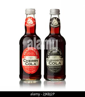 CHISINAU, MOLDOVA - July 24, 2022: Fentimans Cola bottles is the world's first cola brewed by botanical brewing on white background. File contains cli Stock Photo