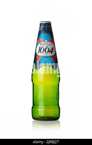 CHISINAU, MOLDOVA - July 24, 2022: Cold bottle of Kronenbourg 1664 beer isolated on white background. A 5.5% pale lager is the main brand of Kronenbou Stock Photo