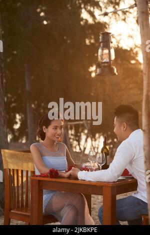 Beautiful young woman having romantic dinner with her boyfriend Stock Photo