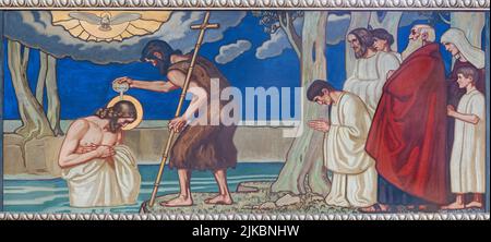 ZURICH, SWITZERLAND - JULY 1, 2022: The fresco of Baptism of Jesus in the church Pfarrkirche Liebfrauen by Fritz Kunz (1906). Stock Photo