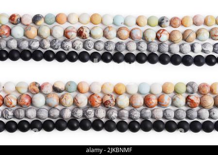 Amazonite, jasper, agate and onyx stone beads  isolated on white background, clipping path included Stock Photo