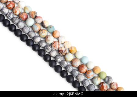 Amazonite, jasper, agate and onyx stone beads  isolated on white background, clipping path included Stock Photo