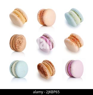 Set of colorful french macarons isolated on white background. Top view. Stock Photo