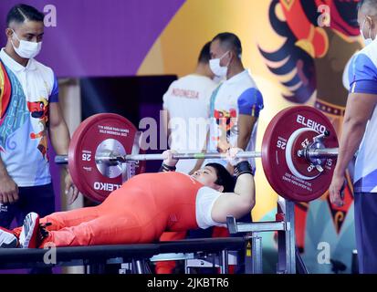 Surakarta, Indonesia. 1st Aug, 2022. Rani Puji Astuti of Indonesia competes during the women's up to 61kg powerlifting final at the 2022 ASEAN Para Games in Surakarta, Indonesia, Aug. 1, 2022. Credit: Agung Kuncahya B./Xinhua/Alamy Live News Stock Photo