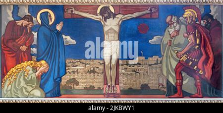 ZURICH, SWITZERLAND - JULY 1, 2022: The fresco of Crucifixion in the church Pfarrkirche Liebfrauen by Fritz Kunz (1906). Stock Photo