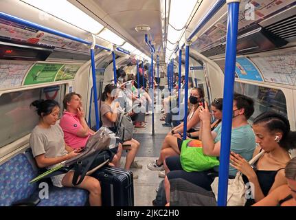 Victoria line Tube train carriage, at Kings Cross St Pancras, London, going to Brixton from Walthamstow Central Stock Photo