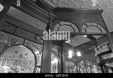 BW monochrome image of Ornate Private Bar doors, at the, Red Lion, 2 Duke of York St,  Mayfair, London, England, UK, SW1Y 6JP Stock Photo