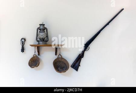 decoration on the wall with field and hunting objects Stock Photo