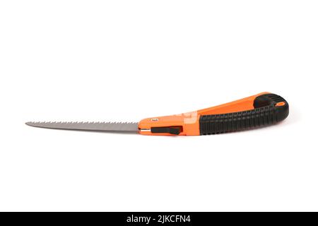 Folding garden saw in the folded state isolated on a white background, pocket saw. High resolution photo. Full depth of field. Stock Photo