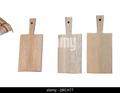 Three minimalistic wooden chopping boards with handles isolated on a white background Stock Photo