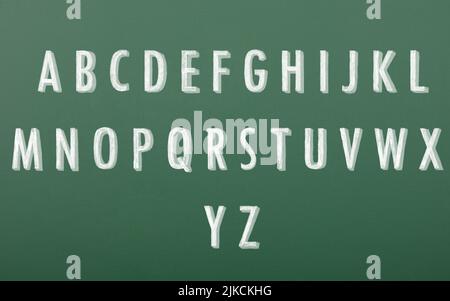 Decorative alphabet letters drawn on chalkboard. Letters written in chalk Stock Photo