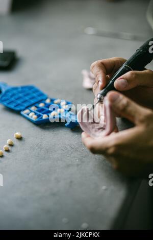 mechanical retention for adhesion of resin of dental prosthesis Stock Photo
